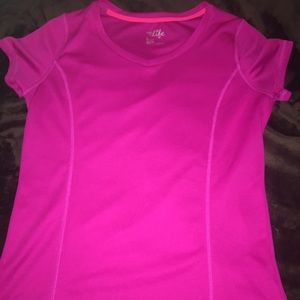 Selling a pink work out t-shirt